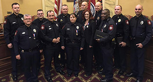Group photo from police ceremony